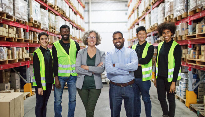Workforce employees at warehouse with leadership