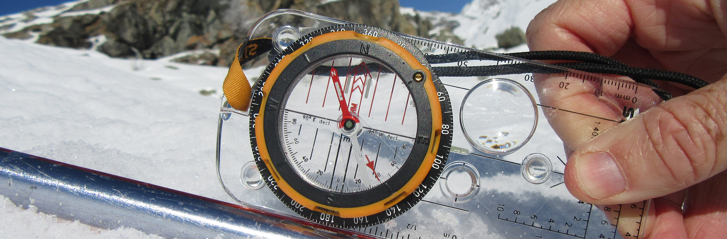 TH Using a built in clinometer a trekking pole helps provide a straight edge on which to measure the slope angle