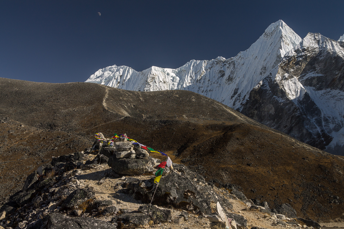 Prayer Flags At The Top Of A Moraine Above  Ama  Dablam Base Camp At Around 5000M The Scenery Is Dominated By  Malanphulan 6573M And Its Impressive North Face