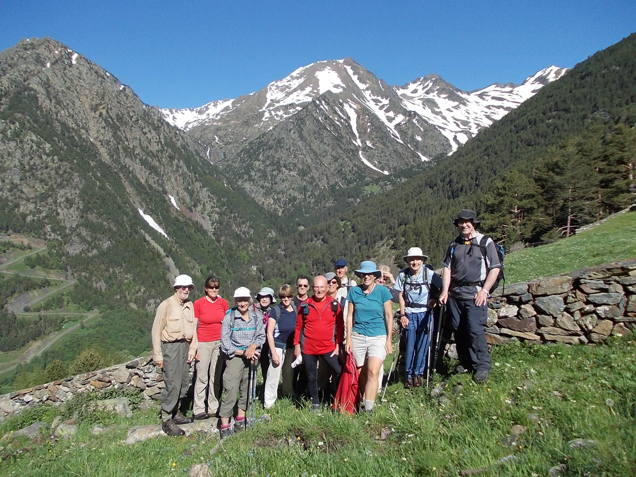 A happy rambling group in Andorra with Pic de la Coma Pedrosa behind